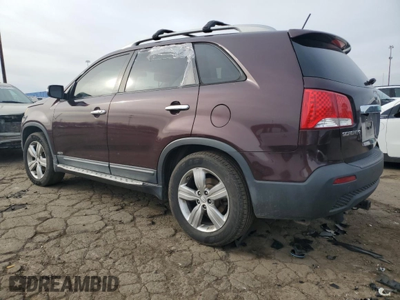 2012 Kia Sorento EX with VIN 5XYKUDA21CG201442, listed as a Copart auction lot 80690424 with 103,040 mi miles and Salvage Title. Bid and sale history available at carsss.com. Image 2.
