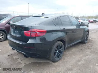 2012 BMW X6 M with VIN 5YMGZ0C58CLK14885, listed as a IAAI auction lot 42082928 with 131,900 mi miles. Bid and sale history available at carsss.com. Image 4.
