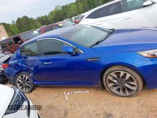 2015 Kia Optima SX z VIN 5XXGR4A76FG478194, wystawiony jako IAAI lot #42037417 z przebiegiem 113 492 mil mil oraz . Historia ofert i sprzedaży dostępna na DreamBid. Obrazek 13.