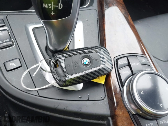 2014 BMW 3 Series 328i xDrive with VIN WBA3B5G58ENS06227, listed as a IAAI auction lot 42611833 with 79,509 mi miles and . Bid and sale history available at DreamBid. Image 11.