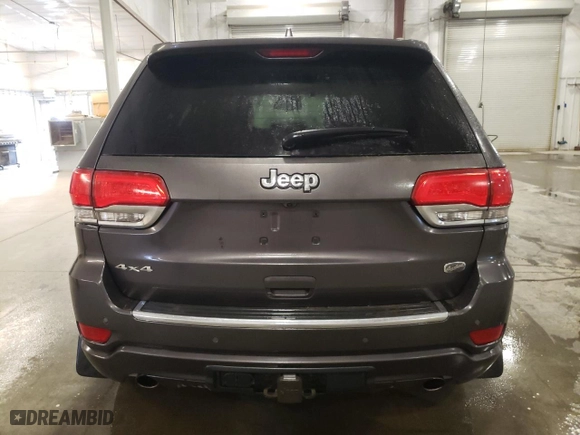 2014 Jeep Grand Cherokee Overland with VIN 1C4RJFCG6EC279248, listed as a Copart auction lot 49300895 with 165,248 mi miles and Salvage Title. Bid and sale history available at carsss.com. Image 6.