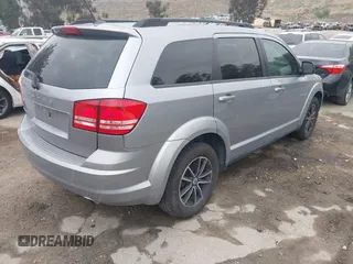 2018 Dodge Journey SE with VIN 3C4PDCAB1JT141295, listed as a IAAI auction lot 42098218 with 110,691 mi miles. Bid and sale history available at carsss.com. Image 4.