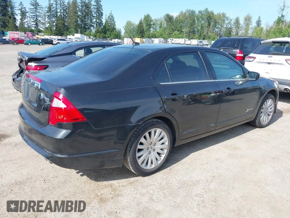 2012 Ford Fusion Hybrid z VIN 3FADP0L31CR380821, wystawiony jako IAAI lot #42332256 z przebiegiem 59 431 mil mil oraz . Historia ofert i sprzedaży dostępna na DreamBid. Obrazek 4.