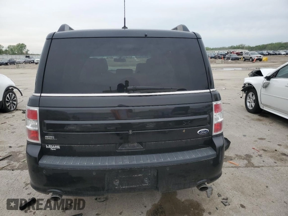 2015 Ford Flex SEL z VIN 2FMGK5C83FBA22276, wystawiony jako Copart lot #54194565 z przebiegiem 121 430 mil mil oraz Szkoda całkowita • Salvage title. Historia ofert i sprzedaży dostępna na DreamBid. Obrazek 6.