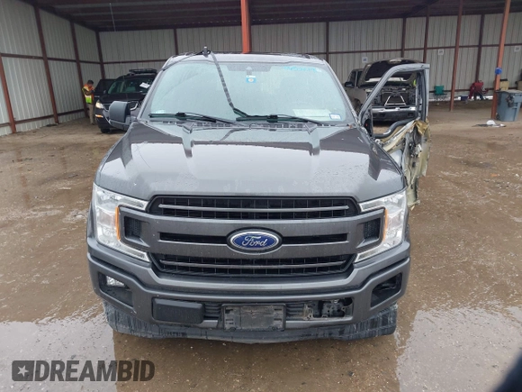 2019 Ford F-150 XL with VIN 1FTEW1C56KKC31025, listed as a IAAI auction lot 41452618 with 153,422 mi miles and . Bid and sale history available at DreamBid. Image 12.