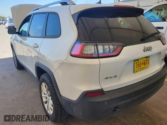 2020 Jeep Cherokee Latitude with VIN 1C4PJMCB1LD602371, listed as a IAAI auction lot 42806971 with 81,291 mi miles and . Bid and sale history available at DreamBid. Image 18.