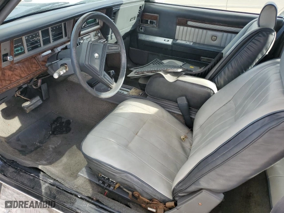 1985 Chrysler LeBaron Mark Cross with VIN 1C3BC55E0FG160918, listed as a Copart auction lot 76659284 with NaN miles and Salvage Title. Bid and sale history available at carsss.com. Image 7.