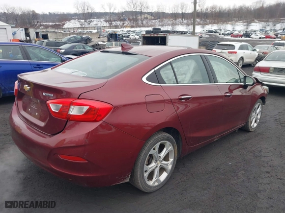 2016 Chevrolet Cruze Premier with VIN 1G1BG5SM6G7312576, listed as a IAAI auction lot 41542503 with 112,867 mi miles. Bid and sale history available at carsss.com. Image 4.
