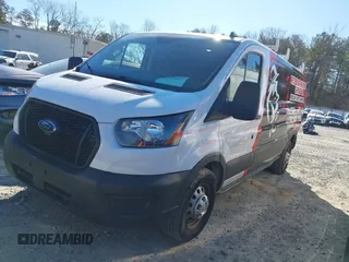2022 Ford Transit Cargo with VIN 1FTBR2Y84NKA64395, listed as a IAAI auction lot 41359067 with 59,393 mi miles and . Bid and sale history available at DreamBid. Image 17.