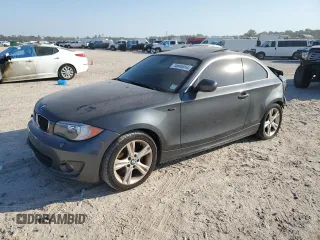 2013 BMW 1 Series 128i with VIN WBAUP7C52DVP24761, listed as a Copart auction lot 74695554 with Not Provided miles and Salvage Title. Bid and sale history available at carsss.com. Image 1.