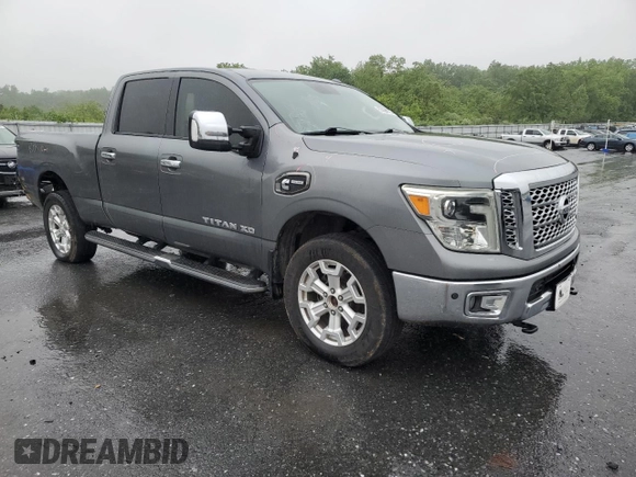 2016 Nissan Titan SL with VIN 1N6BA1F48GN511567, listed as a Copart auction lot 57864775 with 141,545 mi miles and Salvage title. Bid and sale history available at DreamBid. Image 4.