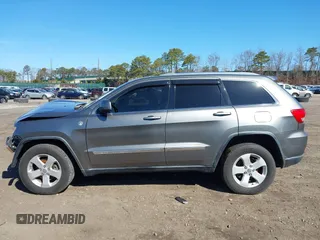 2012 Jeep Grand Cherokee Laredo with VIN 1C4RJFAG0CC145061, listed as a IAAI auction lot 41820140 with 185,015 mi miles. Bid and sale history available at carsss.com. Image 14.