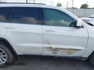 2022 Jeep Grand Cherokee Laredo X with VIN 1C4RJEAGXNC180641, listed as a IAAI auction lot 42074598 with 54,981 mi miles and . Bid and sale history available at DreamBid. Image 13.