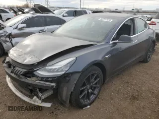 2018 Tesla Model 3 Long Range Battery z VIN 5YJ3E1EB3JF103804, wystawiony jako Copart lot #83752134 z przebiegiem 128 507 mil mil oraz Szkoda całkowita • Salvage title. Historia ofert i sprzedaży dostępna na DreamBid. Obrazek 1.