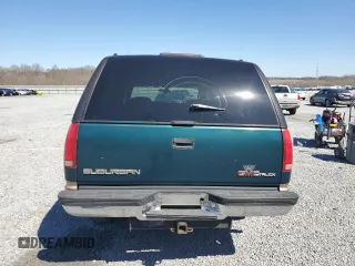 1997 GMC Suburban z VIN 1GKFK16R0VJ749323, wystawiony jako Copart lot #50222125 z przebiegiem 209 355 mil mil oraz Szkody całkowita. Historia ofert i sprzedaży dostępna na DreamBid. Obrazek 6.