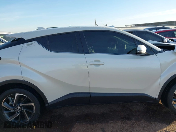 2021 Toyota C-HR LE with VIN JTNKHMBX3M1114590, listed as a IAAI auction lot 41560459 with 61,803 mi miles. Bid and sale history available at carsss.com. Image 13.