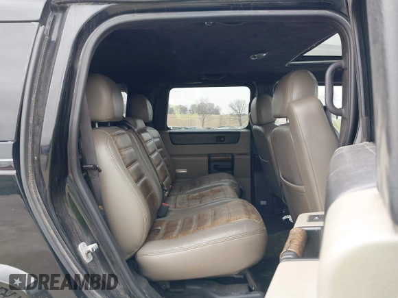 2005 Hummer H2 SUV z VIN 5GRGN23UX5H106375, wystawiony jako IAAI lot #41997745 z przebiegiem 152 827 mil mil oraz . Historia ofert i sprzedaży dostępna na DreamBid. Obrazek 8.