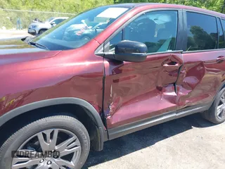 2019 Honda Passport EX-L with VIN 5FNYF7H59KB009956, listed as a IAAI auction lot 42021317 with 58,121 mi miles and . Bid and sale history available at DreamBid. Image 6.