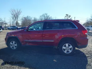 2012 Jeep Grand Cherokee Laredo with VIN 1C4RJFAG7CC297757, listed as a IAAI auction lot 41901645 with 270,731 mi miles. Bid and sale history available at carsss.com. Image 14.