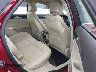 2015 Lincoln MKZ z VIN 3LN6L2GK3FR622116, wystawiony jako IAAI lot #42308692 z przebiegiem 126 047 mil mil oraz . Historia ofert i sprzedaży dostępna na DreamBid. Obrazek 8.
