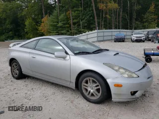 2004 Toyota Celica GT with VIN JTDDR32T040167769, listed as a Copart auction lot 71633564 with 168,797 mi miles and Clean Title. Bid and sale history available at carsss.com. Image 4.