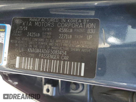2015 Kia Optima Hybrid with VIN KNAGM4AD6F5083454, listed as a Copart auction lot 77230234 with 138,087 mi miles and Clean Title. Bid and sale history available at carsss.com. Image 12.