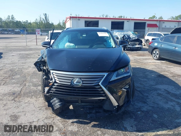 2019 Lexus RX with VIN 2T2ZZMCA4KC129338, listed as a IAAI auction lot 41866980 with 72,265 mi miles. Bid and sale history available at carsss.com. Image 13.