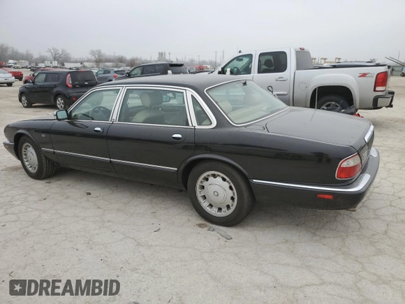 1999 Jaguar XJ z VIN SAJKD6043XC872105, wystawiony jako Copart lot #86270724 z przebiegiem Nie podano mil oraz Szkoda całkowita • Salvage title. Historia ofert i sprzedaży dostępna na DreamBid. Obrazek 2.