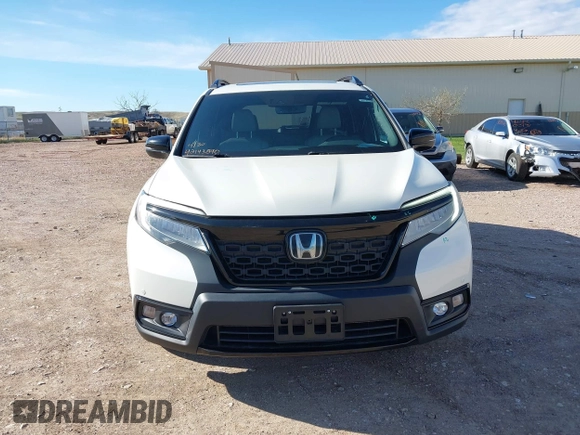 2019 Honda Passport Elite z VIN 5FNYF8H0XKB001472, wystawiony jako IAAI lot #42143890 z przebiegiem 98 119 mil mil oraz . Historia ofert i sprzedaży dostępna na DreamBid. Obrazek 13.