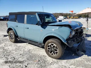 2022 Ford Bronco with VIN 1FMDE5DH7NLB59776, listed as a Copart auction lot 84913034 with 35,035 mi miles and Salvage Title. Bid and sale history available at DreamBid. Image 4.