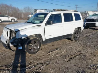 2015 Jeep Patriot High Altitude with VIN 1C4NJRFB1FD155335, listed as a IAAI auction lot 41501790 with 133,537 mi miles and . Bid and sale history available at carsss.com. Image 2.