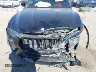2022 Maserati Levante Modena S z VIN ZN661ZUM0NX400467, wystawiony jako IAAI lot #41294140 z przebiegiem 93 148 mil mil oraz . Historia ofert i sprzedaży dostępna na DreamBid. Obrazek 6.