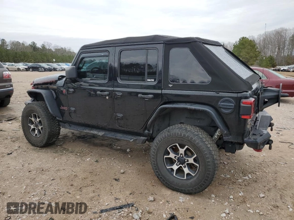 2021 Jeep Wrangler Unlimited Rubicon with VIN 1C4JJXFM0MW627692, listed as a Copart auction lot 43525105 with 102,472 mi miles and Salvage Title. Bid and sale history available at carsss.com. Image 2.