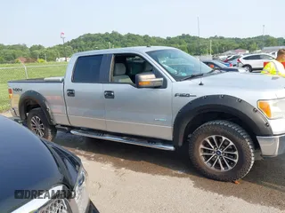 2011 Ford F-150 XLT with VIN 1FTFW1ET2BFC25909, listed as a IAAI auction lot 42463772 with 258,949 mi miles and . Bid and sale history available at DreamBid. Image 14.