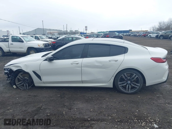 2023 BMW 8 Series M850i with VIN WBAGV8C06PCK97193, listed as a IAAI auction lot 41888779 with 40,845 mi miles and . Bid and sale history available at DreamBid. Image 14.