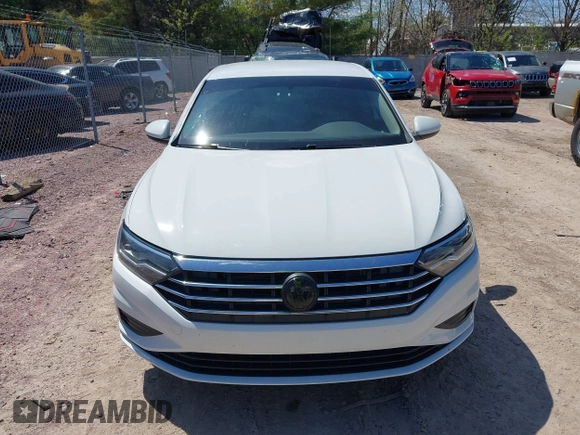 2021 Volkswagen Jetta S z VIN 3VWC57BU6MM045659, wystawiony jako IAAI lot #42201090 z przebiegiem 66 937 mil mil oraz . Historia ofert i sprzedaży dostępna na DreamBid. Obrazek 13.
