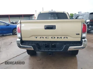2020 Toyota Tacoma SR5 with VIN 5TFCZ5AN7LX231676, listed as a IAAI auction lot 42596728 with 101,362 mi miles and . Bid and sale history available at DreamBid. Image 16.