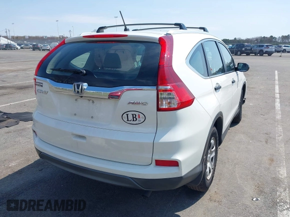 2015 Honda CR-V LX with VIN 5J6RM4H39FL032027, listed as a IAAI auction lot 42013029 with 79,210 mi miles and . Bid and sale history available at DreamBid. Image 4.
