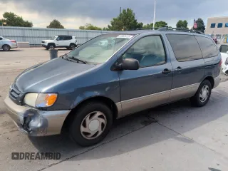 2001 Toyota Sienna LE with VIN 4T3ZF13C01U402096, listed as a Copart auction lot 63660415 with 183,840 mi miles and Salvage title. Bid and sale history available at DreamBid. Image 1.