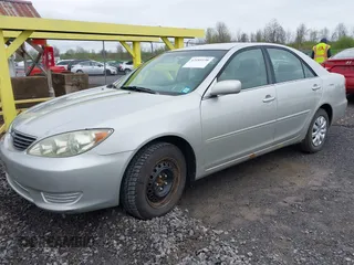 2006 Toyota Camry STD with VIN 4T1BE32K26U670270, listed as a IAAI auction lot 42185538 with 203,431 mi miles. Bid and sale history available at carsss.com. Image 2.