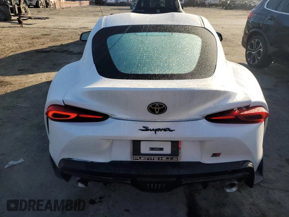 2024 Toyota Supra 3.0 z VIN WZ1DB0G07RW068079, wystawiony jako Copart lot #83999094 z przebiegiem 387 mil mil oraz Szkoda całkowita • Salvage title. Historia ofert i sprzedaży dostępna na DreamBid. Obrazek 6.