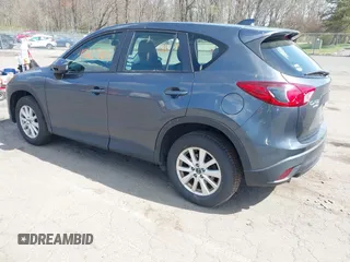 2013 Mazda CX-5 Sport with VIN JM3KE4BE7D0164398, listed as a IAAI auction lot 42107164 with 166,852 mi miles. Bid and sale history available at carsss.com. Image 3.