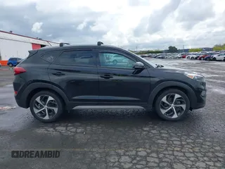 2017 Hyundai Tucson Value with VIN KM8J3CA28HU394750, listed as a IAAI auction lot 41960452 with 138,134 mi miles. Bid and sale history available at carsss.com. Image 13.