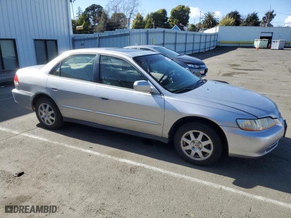2002 Honda Accord Sdn SE with VIN JHMCG66832C010112, listed as a Copart auction lot 48995505 with 299,488 mi miles and Salvage Title. Bid and sale history available at carsss.com. Image 4.