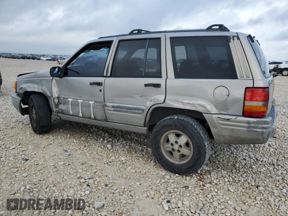 1998 Jeep Grand Cherokee with VIN 1J4FX48S6WC345358, listed as a Copart auction lot 85057454 with Not provided miles and Salvage title. Bid and sale history available at DreamBid. Image 2.