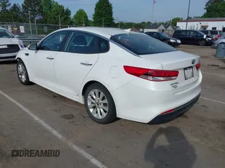 2016 Kia Optima LX with VIN 5XXGT4L34GG061718, listed as a IAAI auction lot 42176256 with 115,572 mi miles and . Bid and sale history available at carsss.com. Image 3.