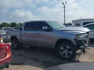 2019 Ram 1500 Laramie with VIN 1C6SRFJT8KN686506, listed as a IAAI auction lot 42499382 with 145,287 mi miles and . Bid and sale history available at DreamBid. Image 14.
