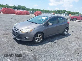 2014 Ford Focus SE z VIN 1FADP3K20EL188088, wystawiony jako IAAI lot #42455783 z przebiegiem 201 105 mil mil oraz . Historia ofert i sprzedaży dostępna na DreamBid. Obrazek 2.