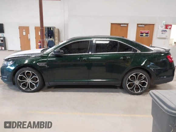 2013 Ford Taurus SHO z VIN 1FAHP2KT8DG142620, wystawiony jako IAAI lot #41800583 z przebiegiem 175 812 mil mil oraz . Historia ofert i sprzedaży dostępna na DreamBid. Obrazek 15.