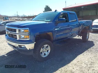 2015 Chevrolet Silverado 1500 LT with VIN 1GCRCREC1FZ308160, listed as a IAAI auction lot 41650625 with 174,936 mi miles. Bid and sale history available at carsss.com. Image 2.